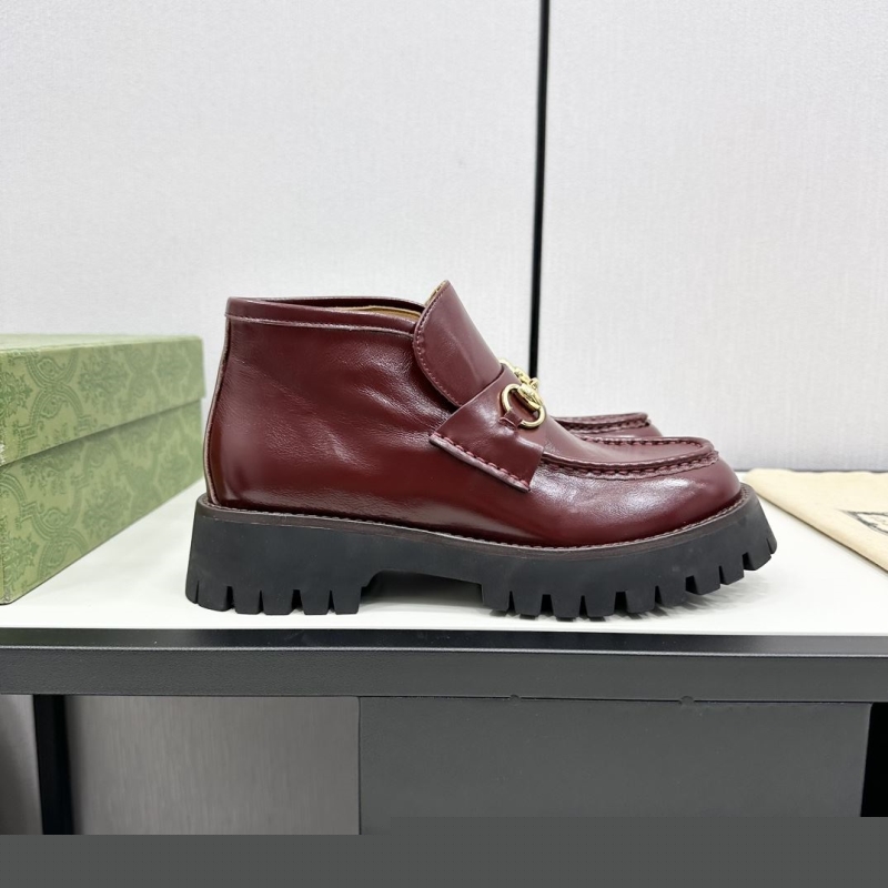 G*u*i boots